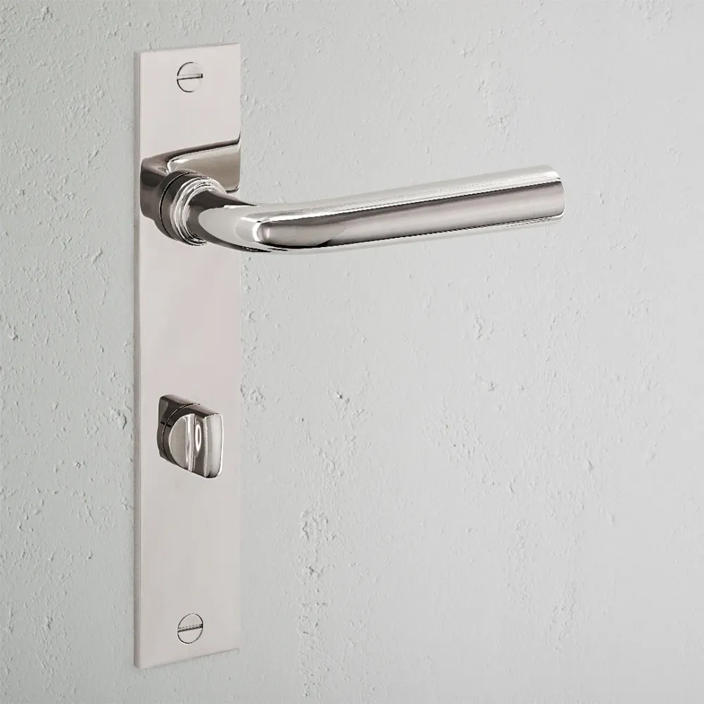 Manilla para puertas Apsley con placa larga (con muelle) y sistema giratorio - Níquel pulido