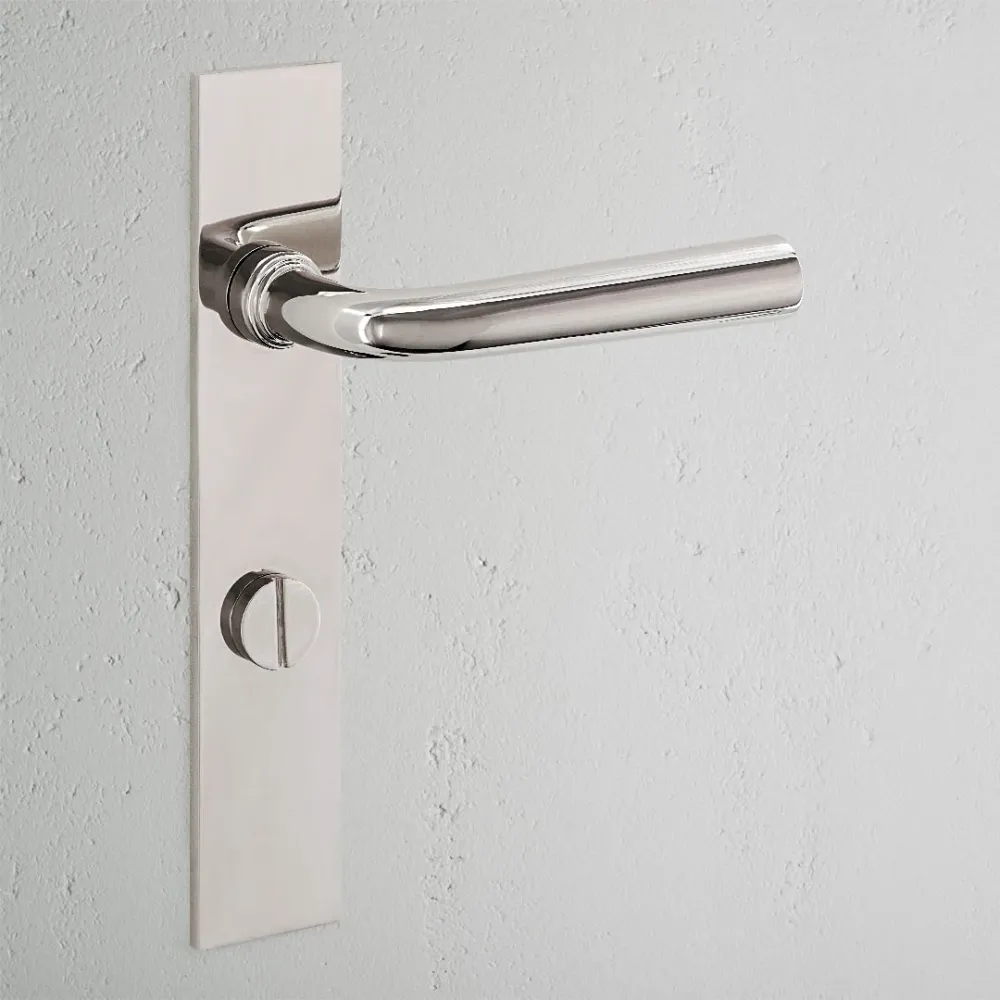 Manilla para puertas Apsley con placa larga (con muelle) y sistema giratorio - Níquel pulido