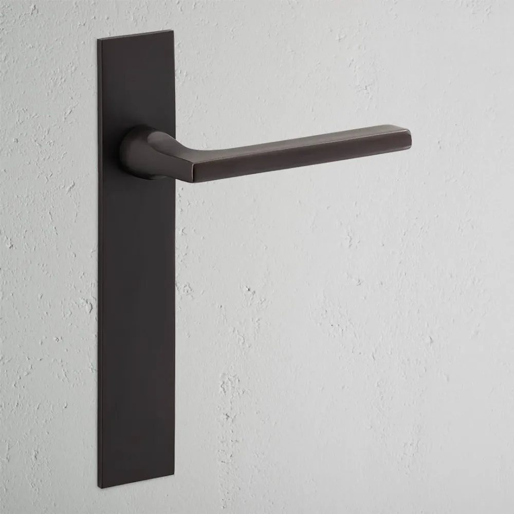 Manilla para puertas Clayton con placa larga (fija) - Bronce