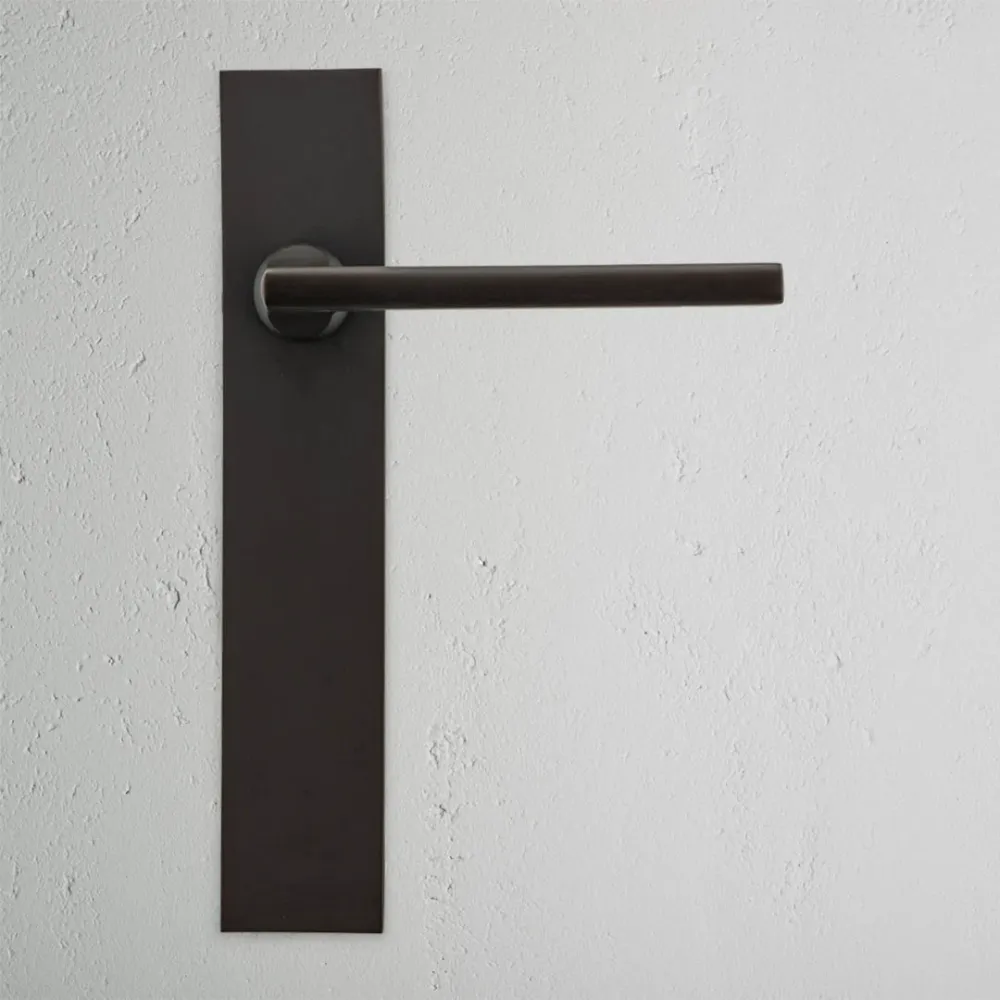 Manilla para puertas Clayton con placa larga (fija) - Bronce