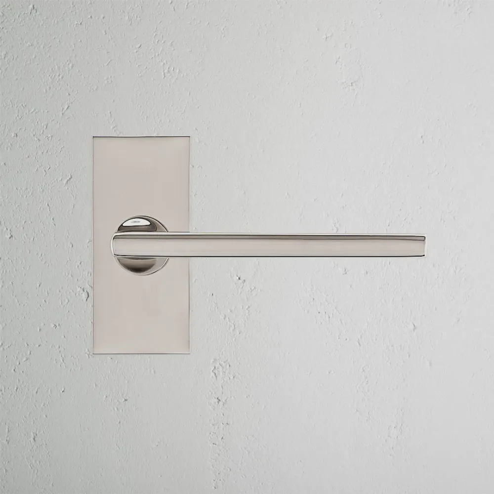 Manilla para puertas Clayton con placa corta (fija) - Níquel pulido