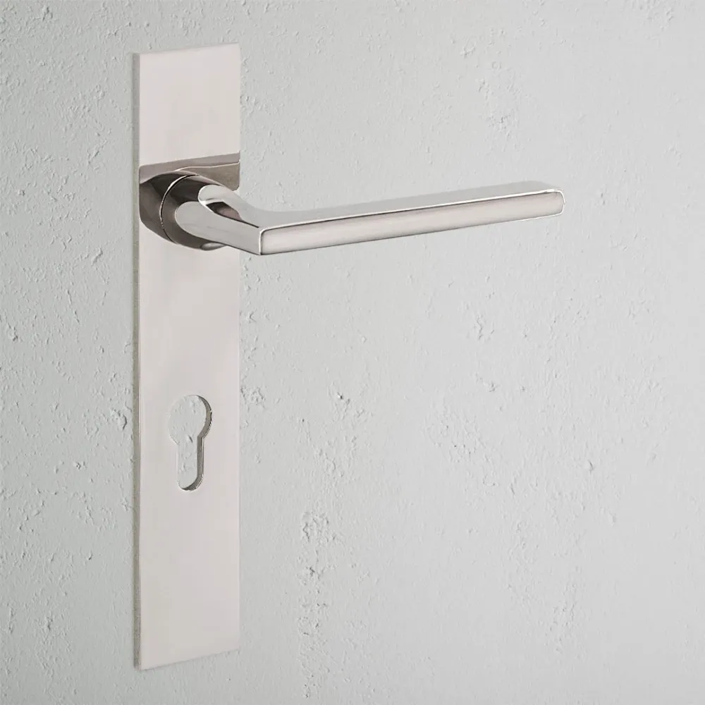 Manilla para puertas Clayton con placa larga (fija) - Níquel pulido