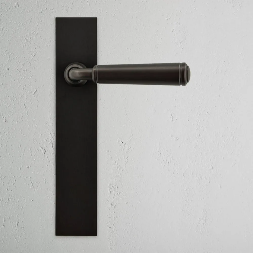 Manilla para puertas Digby con placa larga (fija) - Bronce