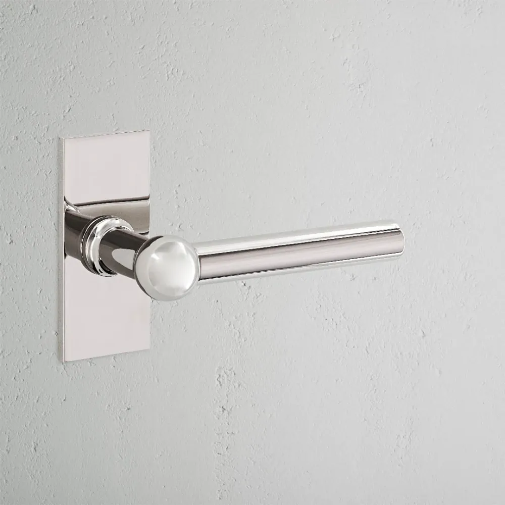 Manilla para puertas Harper con placa corta (fija) - Níquel pulido