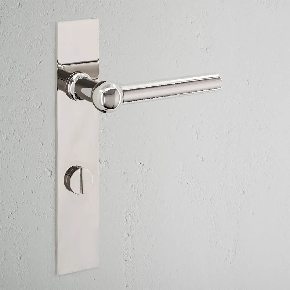 Manilla para puertas Harper con placa larga (con muelle) y sistema giratorio - Níquel pulido