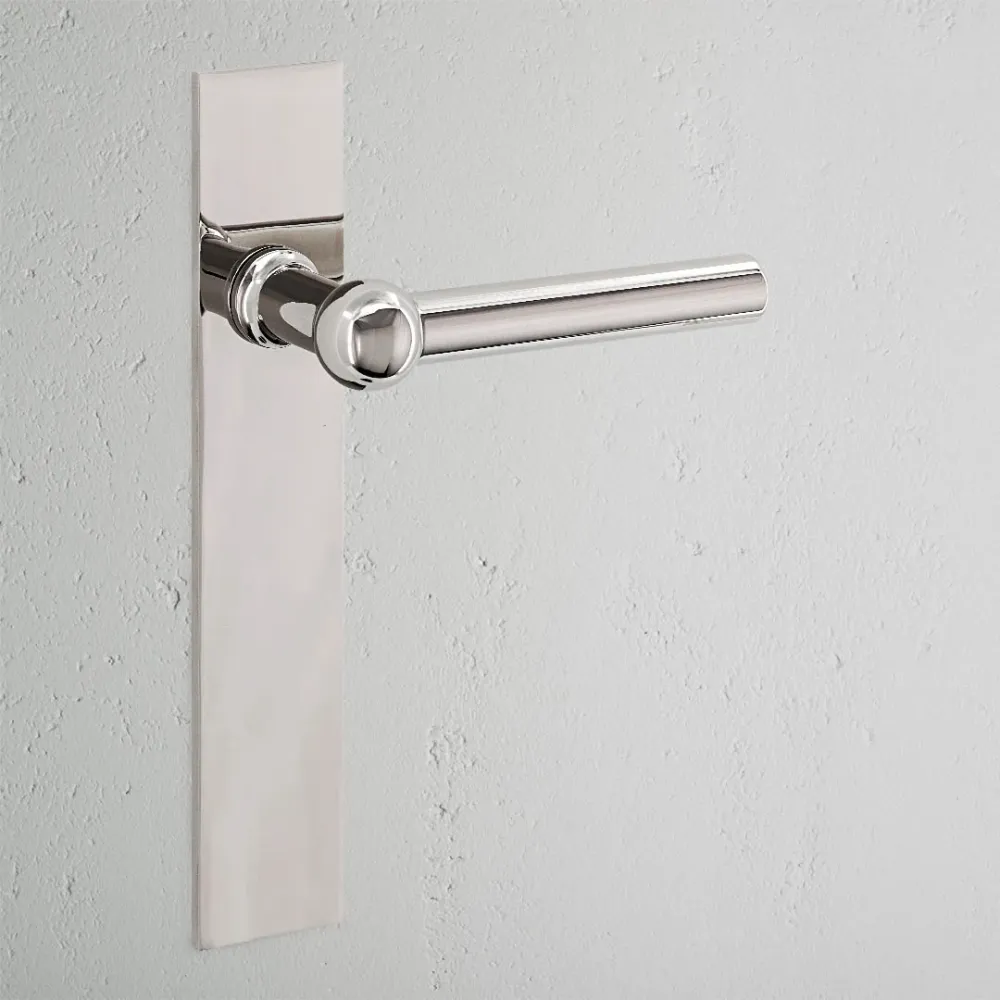 Manilla para puertas Harper con placa larga (fija) - Níquel pulido
