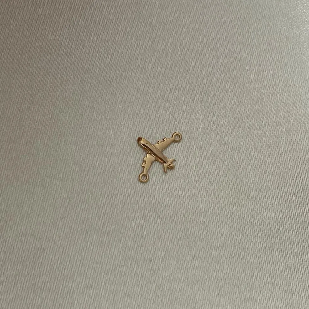 Herraje Avión 0.35gr Oro Amarillo Medellin