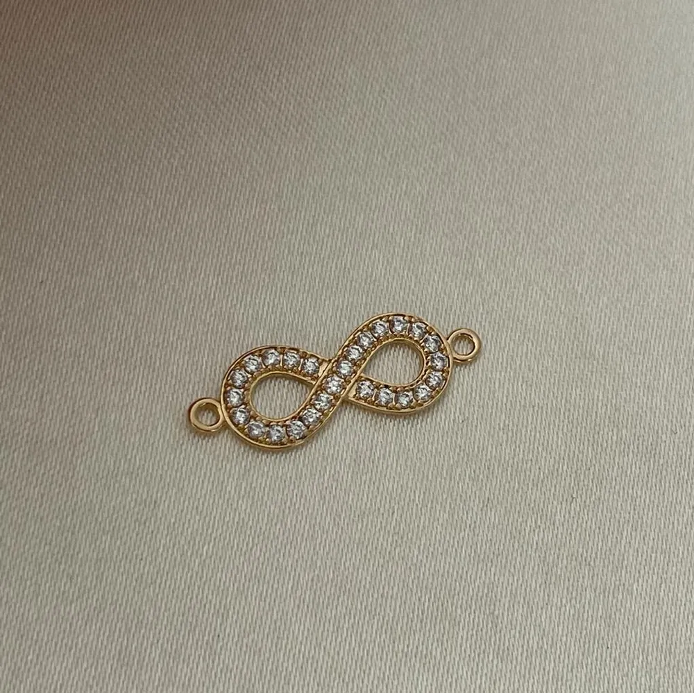 Herraje Infinito 1.5gr/2.5cm Oro Amarillo Circones Blancos Medellin