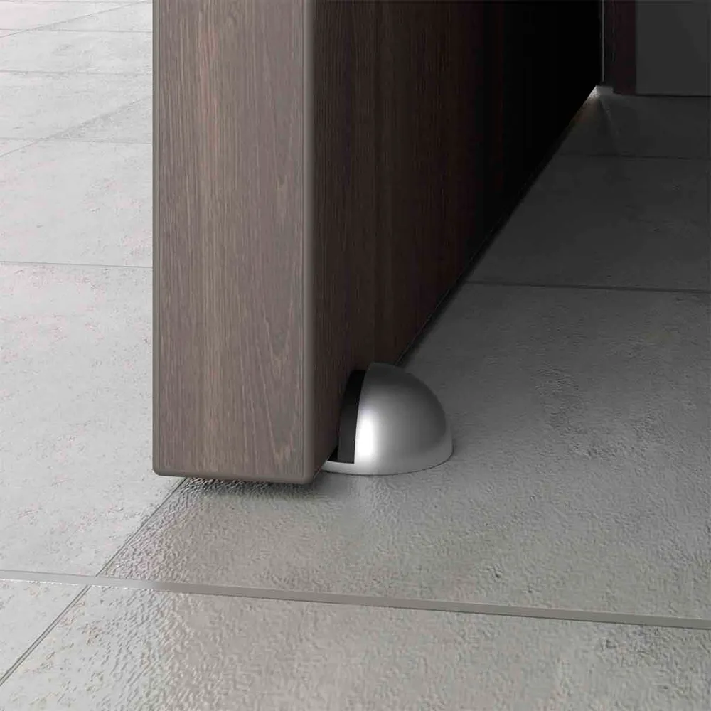 Tope para puerta media luna fijado al piso Niquelado Mobile