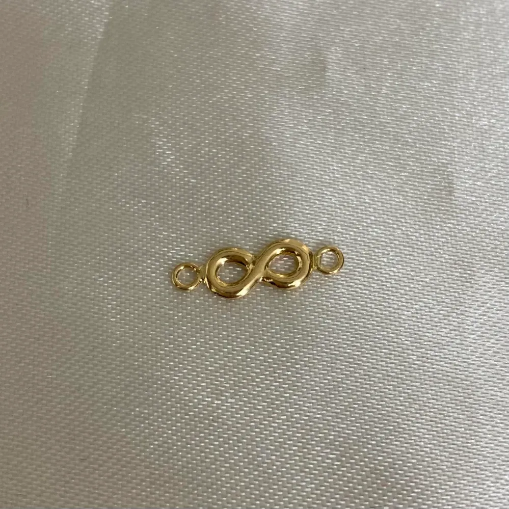 Herraje Infinito 0.3gr Liso Oro Amarillo Oro Nacional